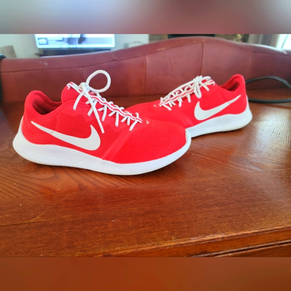 Red and White Nike shoes